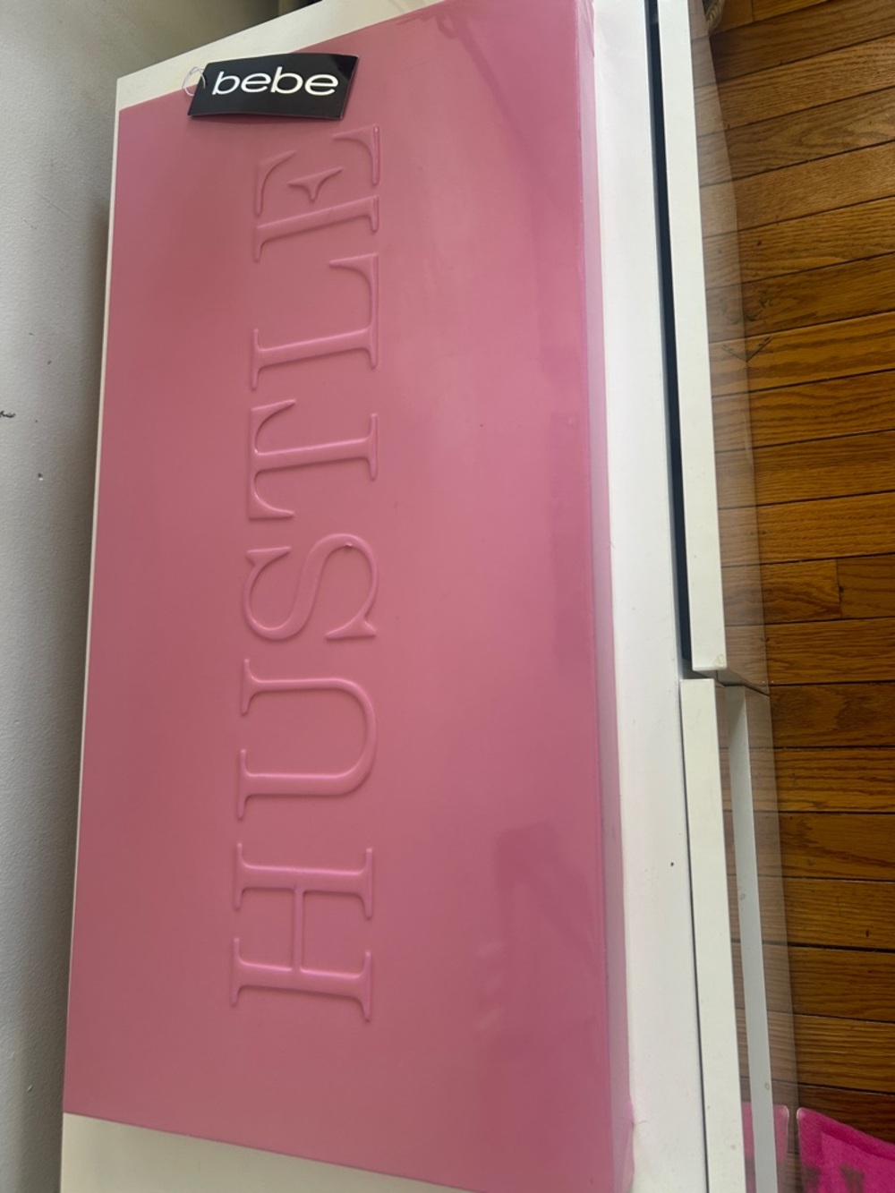 NWT bebe- Pink Embossed "HUSTLE" Wall Art 24”x12”